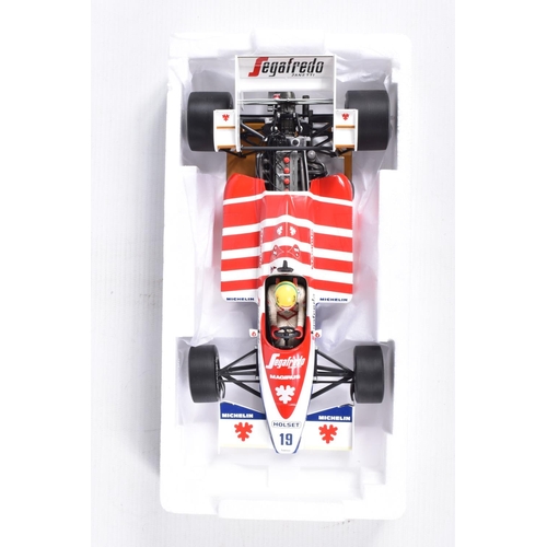 29 - TWO BOXED MINICHAMPS AYRTON SENNA 1:18 SCALE DIECAST MODEL VEHICLES, the first a Toleman Hart TG184 ... 