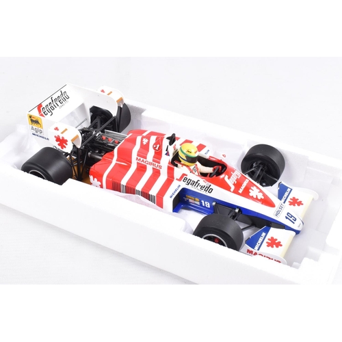 29 - TWO BOXED MINICHAMPS AYRTON SENNA 1:18 SCALE DIECAST MODEL VEHICLES, the first a Toleman Hart TG184 ... 