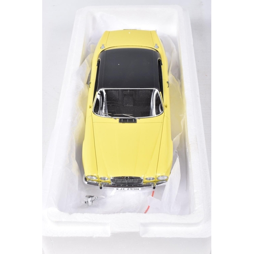 132 - A BOXED BOS JAGUAR XJ 4.2C 1:18 SCALE MODEL VEHICLE, numbered BOS299, yellow body with black roof,  ... 