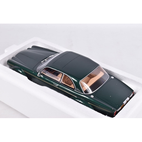 148 - A BOXED GT SPIRIT JAGUAR XJ12 BIG CAT 1:18 SCALE MODEL DIECAST VEHCILE, numbered GT135, appear new i... 