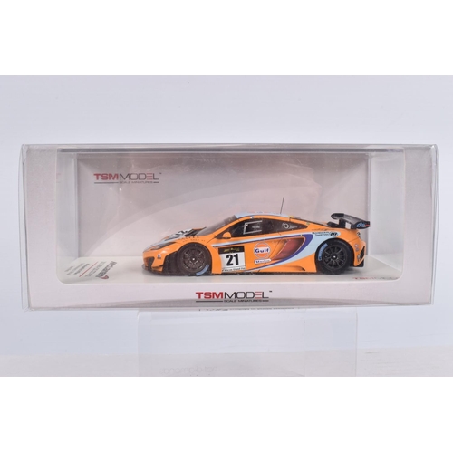 154 - THREE BOXED TSM MODEL MCLAREN MODEL VEHICLES TOGETHER WITH ONE UNBRANDED MCLAREN MODEL, the first is... 