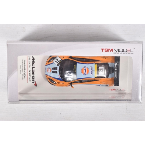 154 - THREE BOXED TSM MODEL MCLAREN MODEL VEHICLES TOGETHER WITH ONE UNBRANDED MCLAREN MODEL, the first is... 