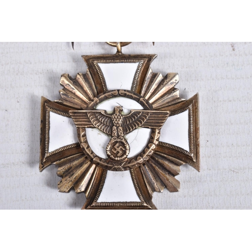 424 - A GERMAN THIRD REICH NSDAP 25 YEAR SERVICE MEDAL, this award is a Dienstauszeichnung der NSDAP 25 Ja... 