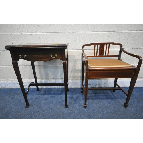 1204 - A 20TH CENTURY MAHOGANY FOLD OVER GAMES TABLE, the fold over top enclosing a green baize, with a sin... 