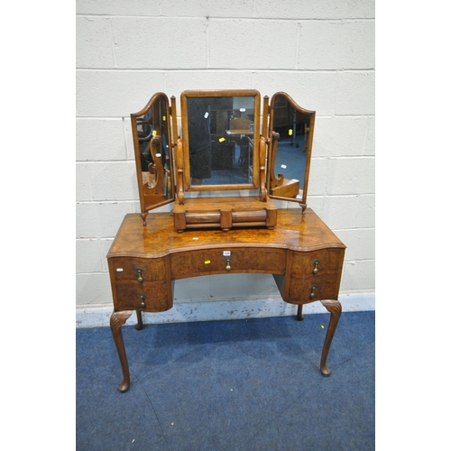 1205 - A PALATIAL BURR WALNUT DRESSING TABLE, with the two wing mirrors, flanking a central section where t... 