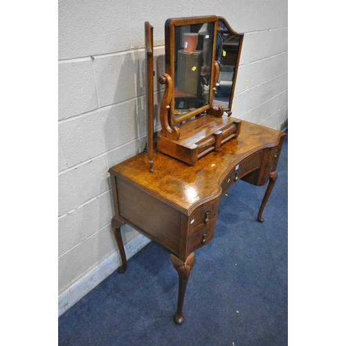 1205 - A PALATIAL BURR WALNUT DRESSING TABLE, with the two wing mirrors, flanking a central section where t... 