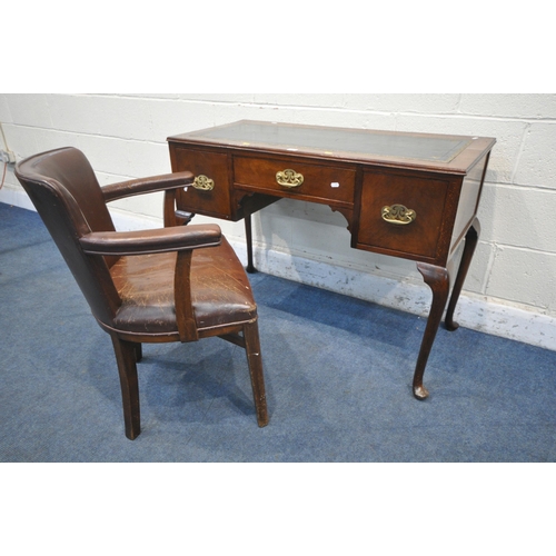 1207 - A 20TH CENTURY MAHOGANY KNEE HOLE DESK, with blue tooled leather writing surface, fitted with three ... 