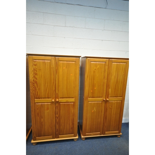 1208 - A PAIR OF MODERN PINE DOUBLE DOOR WARDROBES, width 94cm x depth 72cm x 177cm (condition report: gene... 