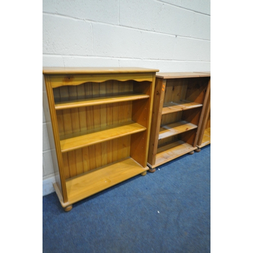 1214 - FOUR PINE OPEN BOOKCASES, with two adjustable shelves, largest width 84cm x depth 29cm x height 100c... 