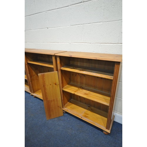 1214 - FOUR PINE OPEN BOOKCASES, with two adjustable shelves, largest width 84cm x depth 29cm x height 100c... 