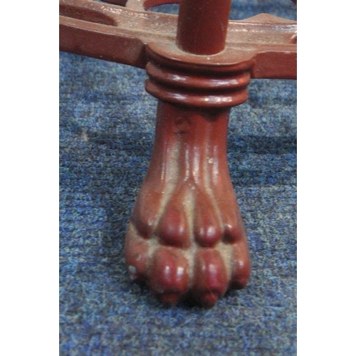 1222 - A BURGUNDY PAINTED CAST ALUMINIUM SIX TIER PAN STAND, of a tapered form, on paw feet, height 123cm (... 