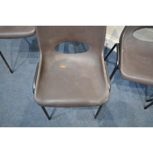 1233 - A SET OF TWELVE BLUE PLASTIC STACKING CHAIRS, along with a set of six brown stacking chairs (conditi... 