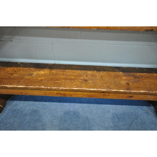 1236 - A PAIR OF 19TH CENTURY PINE BENCHES, from Acresford Methodist Church, with trestle legs, length 214c... 