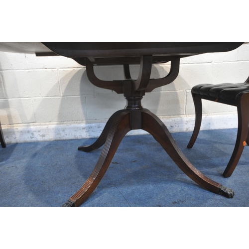 1242 - A REPRODUCTION REPRODUX STYLE MAHOGANY EXTENDING PEDESTAL DINING TABLE, open length 159cm x diameter... 