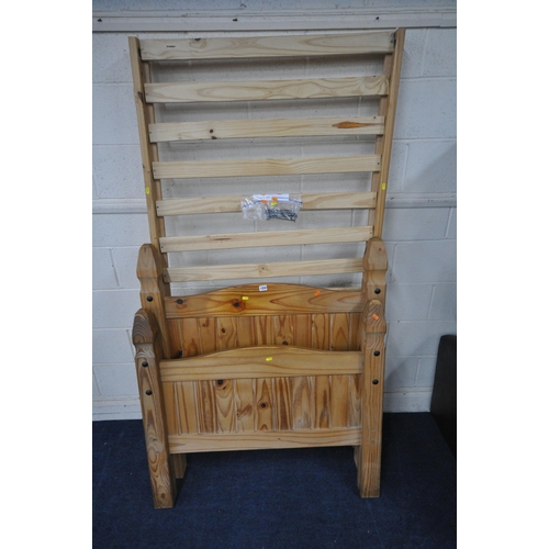 1250 - A MODERN PINE SINGLE BEDSTEAD, with siderails, slats and bolts (condition report: general signs of u... 