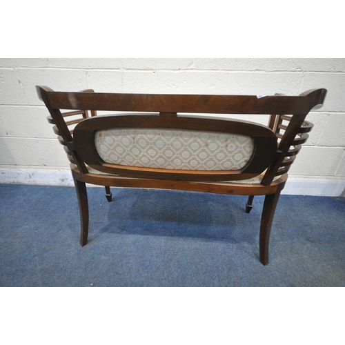 1258 - AN EDWARDIAN MAHOGANY AND INLAID SHERATON REVIVAL TWO SEATER SOFA, with shaped sides and armrests, o... 