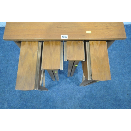 1260 - A SET OF MID CENTURY TEAK PAUL HUNDEVAD NESTING TABLES, comprising one large table and four smaller ... 