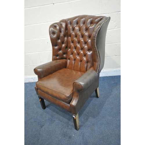 1273 - A BROWN LEATHER BUTTONED WING BACK ARMCHAIR, with studded detail, width 79cm x depth 86cm x height 1... 