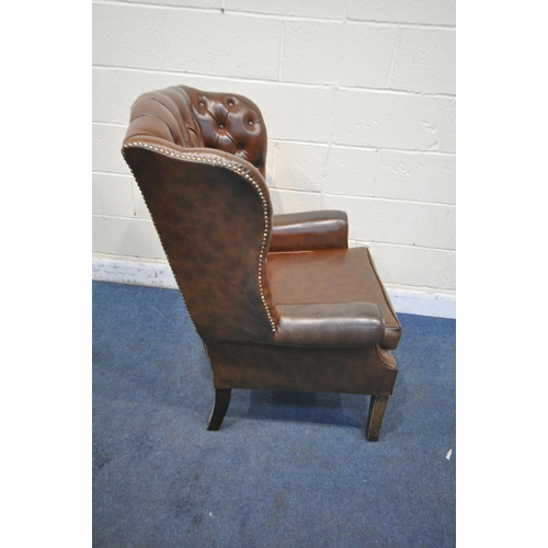 1273 - A BROWN LEATHER BUTTONED WING BACK ARMCHAIR, with studded detail, width 79cm x depth 86cm x height 1... 