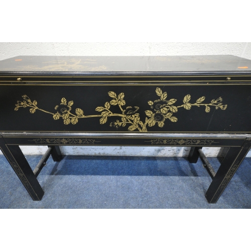 1274 - A 20TH CENTURY BLACK LACQUER AND CHINOISERIE DECORATED BLANKET CHEST ON STAND, with a single hinged ... 