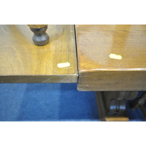 1283 - A SOLID OAK RECTANGULAR DINING TABLE, with two additional leaves, on trestle legs, united by a block... 