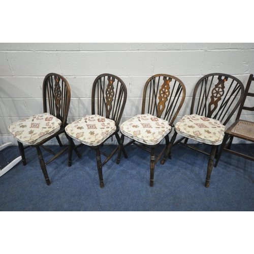 1284 - A SELECTION OF CHAIRS, to include a set of four 20th century oak wheel back chairs, an oak hall chai... 