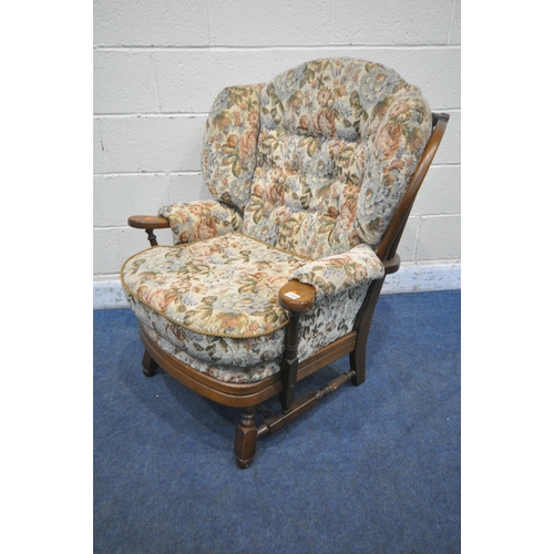 1285 - A 20TH CENTURY OAK FRAMED ARMCHAIR, with floral upholstery, width 83cm x depth 85cm x height 88cm (c... 