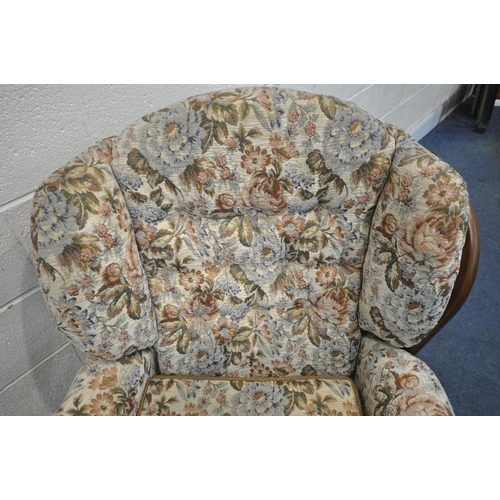 1285 - A 20TH CENTURY OAK FRAMED ARMCHAIR, with floral upholstery, width 83cm x depth 85cm x height 88cm (c... 