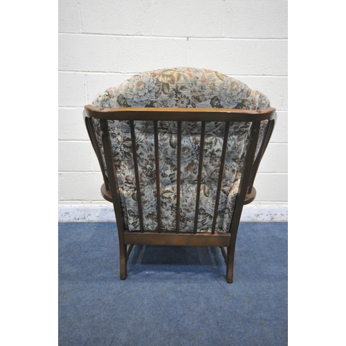 1285 - A 20TH CENTURY OAK FRAMED ARMCHAIR, with floral upholstery, width 83cm x depth 85cm x height 88cm (c... 