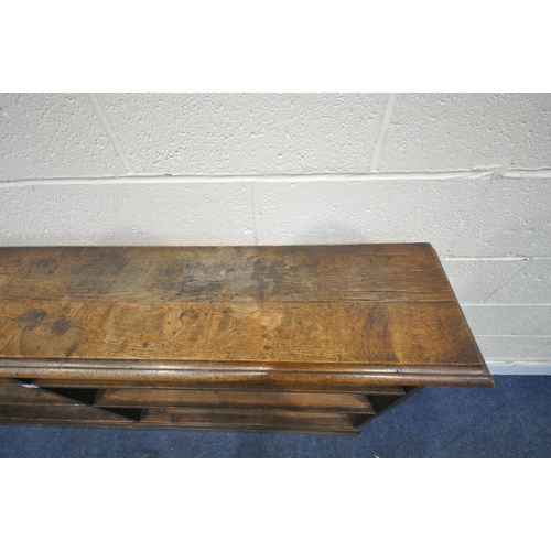 1293 - A 20TH CENTURY OAK OPEN BOOKCASE, fitted with four fixed shelves, length 190cm x depth 28cm x height... 