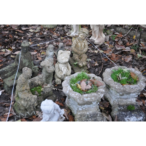 1011 - A SELECTION OF WEATHERED COMPOSITE GARDEN ORNAMENTS/PLANTERS, to include two pairs of shoe shaped pl... 