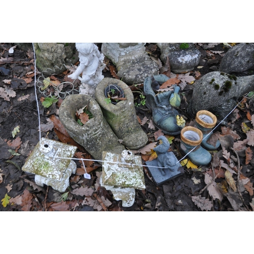 1011 - A SELECTION OF WEATHERED COMPOSITE GARDEN ORNAMENTS/PLANTERS, to include two pairs of shoe shaped pl... 