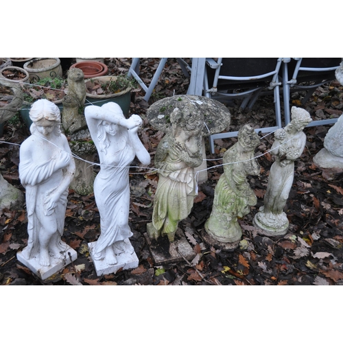 1012 - THREE WEATHERED COMPOSITE GARDEN FIGURES, of scantily clad ladies, max height 80cm, and two plastic ... 