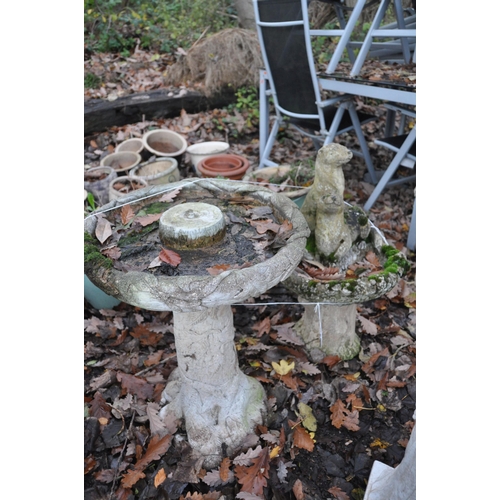 1014 - A WEATHERED COMPOSITE BIRD BATH, of a tree type form, diameter 47cm x height 62cm, and another bird ... 