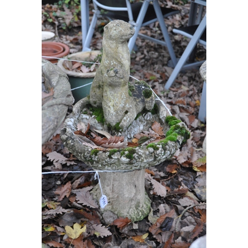 1014 - A WEATHERED COMPOSITE BIRD BATH, of a tree type form, diameter 47cm x height 62cm, and another bird ... 