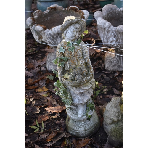 1018 - A WEATHERED COMPOSITE GARDEN FIGURE OF CHERUB ON A REEDED PILLAR, height 86c, along with another com... 