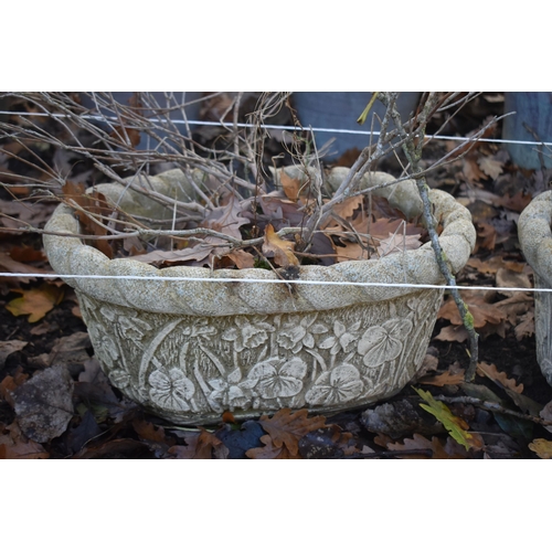 1022 - A PAIR OF  WEATHERED COMPOSITE OVAL PLANTERS, width 45cm, along with two circular planters (conditio... 