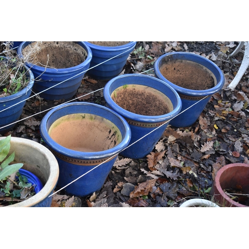 1024 - A SELECTION OF BLUE GLAZED PLANTERS, to include a set of three, two others, along with seven plastic... 