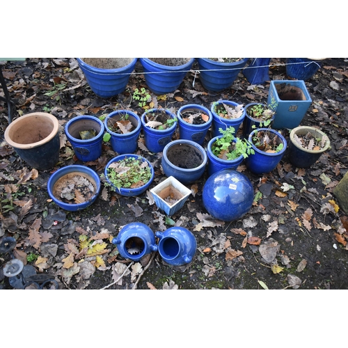 1027 - A LARGE SELECTION OF SMALL BLUE PLANT POTS, of various shapes and sizes, etc (18)