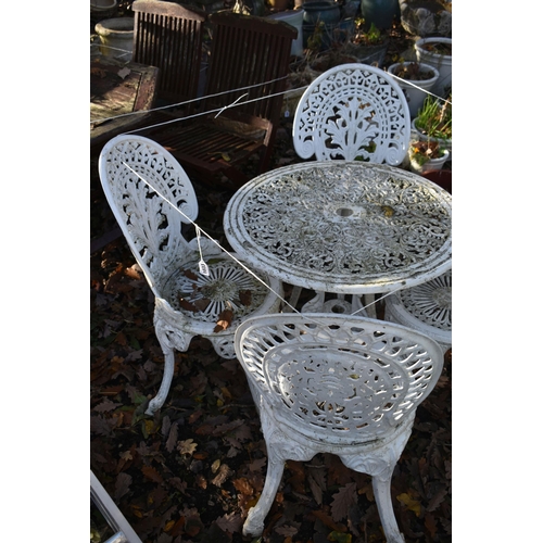 1033 - A WHITE PAINTED CAST ALUMINIUM CIRCULAR GARDEN TABLE, three matching chairs, and a similar chair (co... 