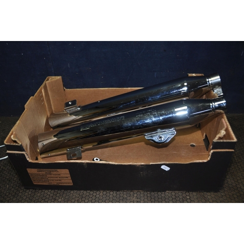 1051 - TWO HARLEY DAVIDSON FAT BOY EXHAUST SILENCERS and a hanging bracket, stamped 64705-08A HDI SP73 and ... 