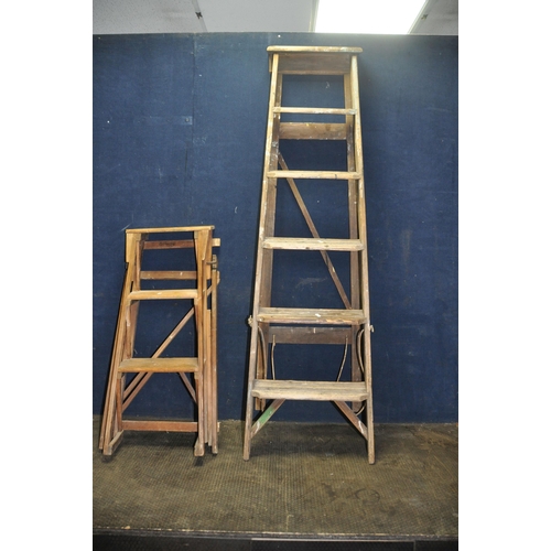 1054 - TWO VINTAGE WOODEN STEP LADDERS comprising of a 160cm high five rung  and a Hatherley Jones Patent 8... 