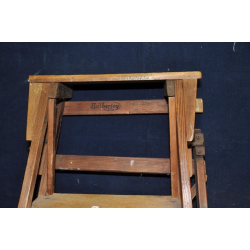 1054 - TWO VINTAGE WOODEN STEP LADDERS comprising of a 160cm high five rung  and a Hatherley Jones Patent 8... 