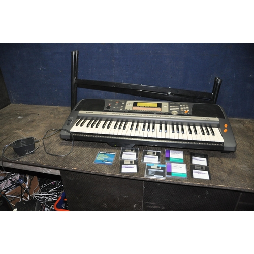 1056 - A YAMAHA PSR-640 ELECTRONIC KEYBOARD with power supply, stand and nine diskettes)(PAT fail due to ba... 