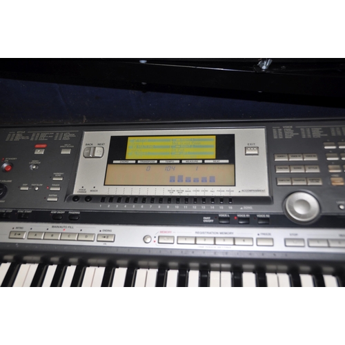 1056 - A YAMAHA PSR-640 ELECTRONIC KEYBOARD with power supply, stand and nine diskettes)(PAT fail due to ba... 