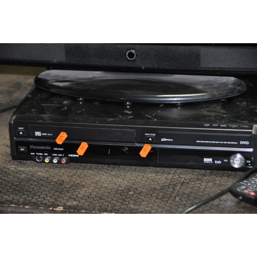 1065 - A PANASONIC DMP-BD79 BLU-RAY PLAYER with remote, a Panasonic DMR-EZ48V DVD video player with remote,... 