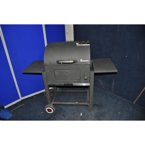 1075 - A LANDMANN SOLID FUEL BARBECUE with domed lid, temperature gauge, height adjustable fuel tray, under... 