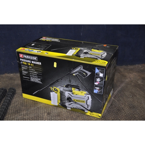 1085 - A BRAND NEW AND SEALED IN BOX PARKSIDE PHD110 A1 PRESSURE WASHER along with a used Karcher T250 plus... 