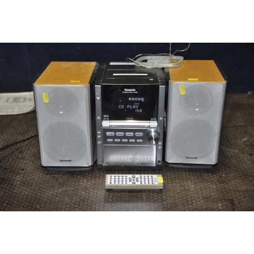 1087 - A PANASONIC SA-PM28 MINI HI FI with matching speakers and remote (PAT pass and working)