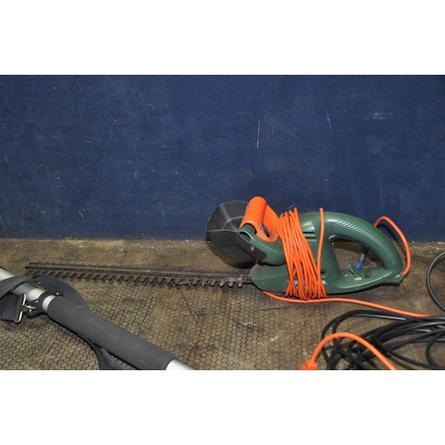 1091 - AN ECKMAN ETHT3 TELESCOPIC HEDGE TRIMMER 160cm long unextended, a Florabest electric chain saw (oil ... 